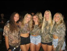 the girls are all wearing camo shirts