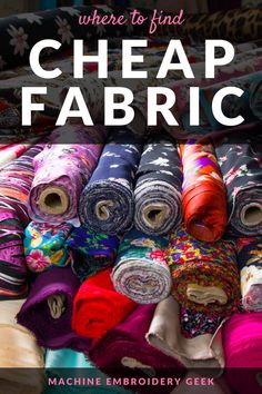 there is a pile of colorful fabric on display with the words, where to find cheap fabric