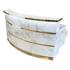 Gold & Marble Reception Desk Trendy Reception Desk, Desk With Gold Accents, Receptionist Desk Design, Parlour Ideas, Beauty Salon Reception Ideas, Marble Reception Desk, Spa Reception Area, Marble Reception, Recessed Shelving