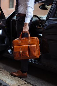 Our company's artisans combine old world craft methods with modern function, thus creating a non-bulky European design that's perfect for today's professional on the go. The rich character of these luxury products will age beautifully and develop into a better version than when first purchased. Briefcases for men are more than an accessory. A leather briefcase bag is an extension of who you are and what you believe in. When we craft leather briefcase bags for men, they are designed to securely h Leather Briefcase Men Business, Lawyer Bag, Teddy Bag, Leather Office Bags, Mens Leather Laptop Bag, Rich Character, Men Briefcase, Black Leather Briefcase, Leather Bag Design