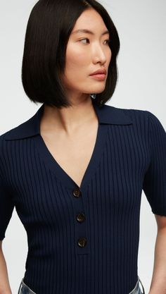 This lightweight knit top has high stretch and a slim fit that tucks perfectly into jeans or trousers. Design features include a ribbed collar, button details, and a three-quarter sleeve. Ribbed Collar Top, Stylish Work Attire, Rib Knit Top, Single Button Blazer, Navy Fashion, Trendy Clothing, Ribbed Top, Collar Top, Flat Iron