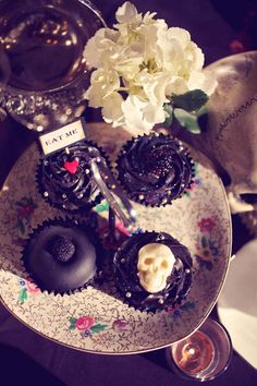 an assortment of pastries on a decorative plate