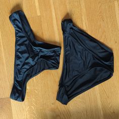 Like New. Never Worn. No Tags Black Seamless Bottoms For Beach Season, Black Seamless Swimwear For Sunbathing, Black Stretch Brief Swimwear, Black Seamless Swimwear For Party, Seamless Black Swimwear For Party, Black Party Swimwear Briefs, Black Seamless Party Swimwear, Black Swimwear Briefs For Sunbathing, Black Fitted Brief Swimwear