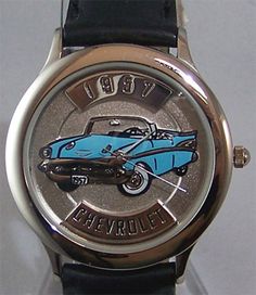 Fossil 1957 Chevy Watch Relic Chevrolet Car Wristwatch in Wood Box Retro Silver Watch With Analog Display, Retro Automatic Collectible Watches, Vintage Blue Watch With Analog Display, Vintage Silver Watch With Analog Display, Retro Silver Watch Accessories With Subdials, Retro Analog-style Collectible Watch Accessories, Silver Retro Watch Accessories With Subdials, Retro Silver Watch Accessories For Anniversary, Vintage Automatic Collectible Watches