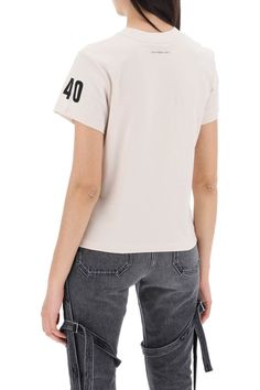 light beige/black cotton jersey texture logo patch to the front logo print to the front and rear number print at the sleeve logo tag to the front crew neck short sleeves straight hem unlinedGender: WomenMaterial: COTTON 100%Color: BEIGEMade in: PTProduct ID: 423JTS006JS0112 9099Unisex Fit: Sizes may vary. For accurate sizing, please contact our customer support team.*Import tax/duty will be calculated at checkout (If applicable) Casual Summer Tops With Logo Lettering, Short Sleeve Tops With Logo Patch For Summer, Beige Cotton T-shirt With Logo Print, Casual Summer Tops With Logo Patch, Summer Cotton Tops With Logo Patch, Casual Tops With Logo Lettering, Casual Summer Tops With Logo Detail, Casual Beige T-shirt With Logo Print, Classic Beige Tops For Streetwear