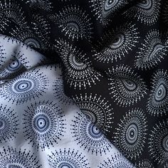 black and white fabric with an intricate design