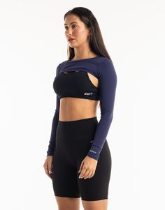 Functional athleisure at its finest. The Range Long Sleeve is the perfect garment to complete your workout look. Featuring a slim fit, super cropped length, the Range Long Sleeve is perfect to throw over your favorite ECHT sportsbra or with Range V3 Sportsbra as shown and matching Range Leggings! - Super Cropped Length - perfect with high-rise pants - Mix and match with your favourite ECHT sportsbra - Fabric: Super soft and breathable - Slim fit skims your body - Silver logo on sleeve - Breathability and ease of movement 81% Nylon, 19% Spandex Range V3 Sportsbra is sold separately. Throw Over, Silver Logo, High Rise Pants, Athleisure, High Rise, Slim Fit, Spandex, Leggings, Range