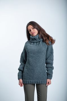 Soft Oversized Sleeve Sweater, Gray Turtleneck Sweater,  Oversized Knitted Sweater,Pullover Sweater, Winter Knit   DETAILS  *Material -Premium Bio Organic EU  Yarn ,certified organic bio yarn, non colored ,no chemical   *100 % Handmade and Homemade locally in Bulgaria /EU / by our own employed knitters. We ensure excellent working conditions- faire paid , free health insurance and 20 days annual paid vacation..     / Made in a smoke-free and pet friendly environment/ *Style - solid *Color - gray Cozy Knitted Sweater With Relaxed Fit, Oversized Long Sleeve Turtleneck For Cold Weather, Winter Relaxed Fit Funnel Neck Sweater, Oversized Knitted Turtleneck With Funnel Neck, Gray Hand-knitted Sweater For Fall, Knitted Sweater With Relaxed Fit For Cold Weather, Relaxed Fit Knitted Turtleneck Sweater, Gray Hand Knitted Sweater For Fall, Oversized Knitted Turtleneck