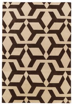 a brown and white rug with an abstract design