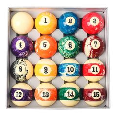 pool balls in a box with numbers on them