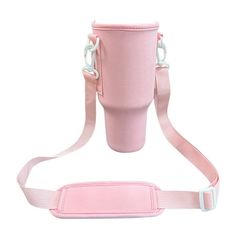 a pink cup with straps attached to it