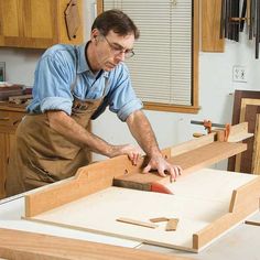 a man working on woodworking in his workshop