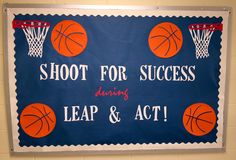 a sign that says shoot for success during leap and act with basketballs on it