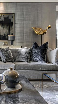 a living room filled with lots of furniture and decor on top of a wooden table