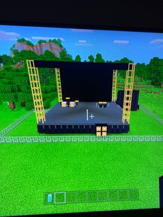 a computer screen showing a stage in the middle of a field