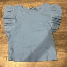 Tank Top Blue Crew Neck Top For Spring, Trendy Blue T-shirt For Spring, Blue Stretch Short Sleeve Shirt, Blue Stretch Shirt For Summer, Trendy Fitted Blue Shirt, Zara Light Blue Tops For Summer, Zara Spring Tops, Light Wash Stretch Casual Tops, Trendy Light Wash Stretch Tops