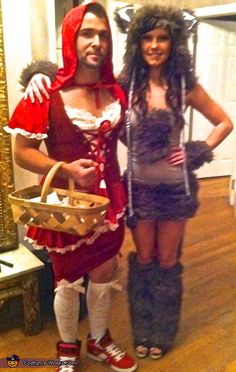 two people dressed in costumes standing next to each other