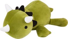 a green stuffed animal with horns laying down