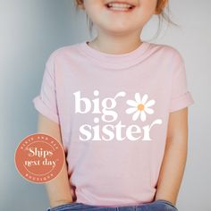 Big Sister T shirt in pink with floral design, promoted to big sister tee, soon to be a big sister, pregnancy announcement shirt Packaging:  The item will be folded and individually package into resealable clear poly bags. It will then be placed inside a box and shipped to you. Material:   100 %  cotton - ethically sourced Regular fit, midweight 180 gsm,  preshrunk to minimise shrinkage Washing Instruction: Wash the T Shirt before wearing it. COLD GENTLE WASH setting with like colours only Flip Personalized Pink T-shirt For Summer, Personalized Short Sleeve T-shirt For Spring, Personalized T-shirt For Spring Gift, Personalized Family Matching Pink T-shirt, Spring Family Matching Personalized T-shirt, Casual Personalized Pink T-shirt, Personalized Pink T-shirt For Mother's Day, Personalized Pink Short Sleeve Tops, Pink Personalized Short Sleeve T-shirt