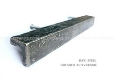 an old metal object on a white background with words below it that read raw steel brushed and varnished