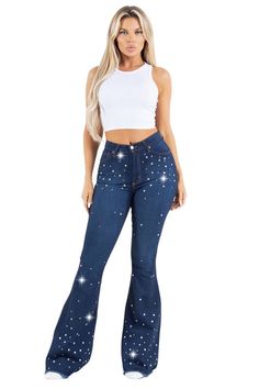 Get ready to dazzle in style with our Vegas Glam Bell Bottom Jeans! Featuring functional pockets, a front button and zipper closure, and hundreds of hand-pressed rhinestones for a diamond-like shine. Proudly made in our LA factory, these jeans are sure to turn heads and make you the center of attention.52% Rayon, 26% Cotton, 21% Polyester, 1% SpandexInseam Length 34"10 Oz DenimMade In USAstretch Level: High Stretch Style: high rise Silhouette: bell bottom Embellishment: rhinetones Length: full length Closure: zipper, button Made In: USAFabric Contents: 52% Rayon, 26% Cotton, 21% Polyester, 1% Spandex Stretch fabric Non-sheer fabric Care Instructions: Dry CleanSize Measurement (inch): 3: 26.0 (Waist), 32.0 (Hips), 34.0 (Inseam), null (Length) 5: 27.0 (Waist), 33.0 (Hips), 34.0 (Inseam), nul Vegas Glam, Denim Short Dresses, Bottom Jeans, Skirt Jumpsuit, Bell Bottom Pants, Denim Leggings, Bell Bottom, Fall Shopping, Sweater And Shorts