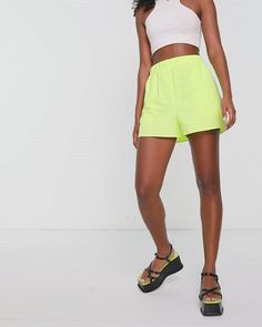 Shorts by Topshop Take the short cut High rise Elastic waist Side slits Relaxed fit