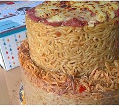 there is a three layer cake made out of noodles