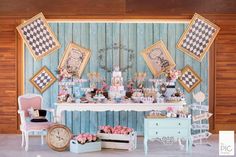 an image of a dessert table set up for a baby's first birthday party