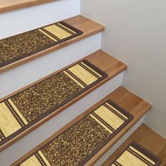 the carpeted stair treads are lined up against the wall