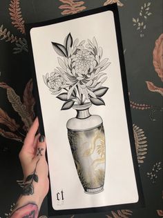 a drawing of a vase with flowers in it