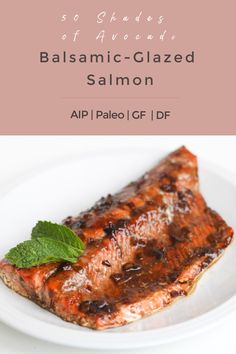 balsamic glazed salmon on a white plate with mint garnish and text overlay