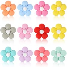 six different colored flower shaped hair clips