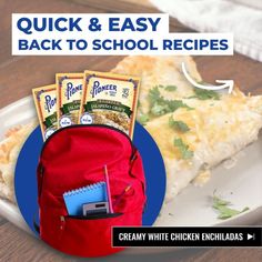 the back to school lunch bag has three packets of food in it and is sitting on a plate