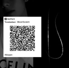 a black and white photo of a person with a qr code on his shirt