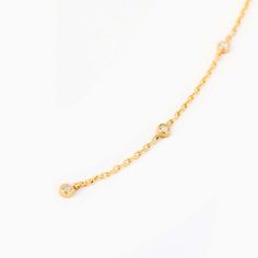 Unveil your elegance with the Diamond Bezel Y Necklace in 14K Solid Gold. This dainty Y necklace, a perfect gift for her, features an exquisite diamond lariat design that enhances any outfit. Crafted from 14k solid gold, this piece of jewelry offers both luxury and durability. Its minimalist design makes it a versatile accessory, perfect for both everyday wear and special occasions. Experience the allure of 14k gold jewelry and let this diamond bezel necklace add a touch of sparkle to your life. Cubic Zirconia Lariat Necklace With Delicate Chain, Delicate Cubic Zirconia Diamond Necklace With Delicate Chain, Dainty Diamond Backdrop Necklace As Gift, Dainty Diamond Backdrop Necklace Gift, Elegant Diamond Backdrop Necklace With Delicate Chain, Dainty Diamond Backdrop Necklace For Gift, Elegant Gold Diamond Backdrop Necklace, Delicate Lariat Cubic Zirconia Necklace, Delicate Diamond Station Necklace