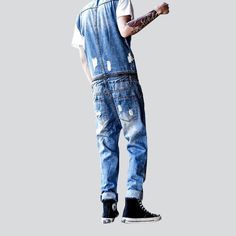 Make a statement this season with our 2023 Spring-Summer Collection of distressed bare-shoulder men's denim overalls! Crafted with an edgy distressed pattern for a modern street style. these overalls offer a blend of contemporary fashion and nostalgic grunge. With a slim fit and a seamless blend of a resilient zipper and stylish button closure. these overalls deliver both functionality and flair. Crafted with premium quality denim for durability. our overalls are the ultimate expression of grung Unique Street Style, Modern Street Style, Skater Fit, Jumpsuit Men, Jean Overalls, Street Style Trends, L And Light, Modern Trend, Current Fashion Trends