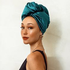 A satin hair wrap that can be worn anytime of the day to provide protection from environmental stressors as well as at night to maintain hairstyles. Satin Hair Wrap, Turban Styles, Hair Salon Tools, Tangle Free Hair, Modern Colours, Hair Towel Wrap, Head Wrap Styles, Hair Turban, Satin Style