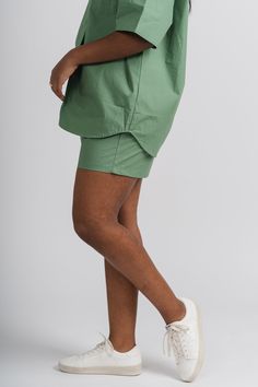 Trendy shorts from Lush Fashion Lounge women's boutique in Oklahoma City. Lush boutique in OKC has a variety of cute shorts and more! Pair these cute shorts with the matching button up top, SOLD SEPARATELY, for a cute look! We are loving cute matching sets for Spring! Model is 5'7 size 26 wearing size small. 100% cotton Green Athletic Shorts With Built-in Liner, Green Cotton Bottoms With Built-in Shorts, Summer Biker Shorts With Pockets, Casual Summer Biker Shorts With Pockets, Casual Biker Shorts With Pockets For Summer, Spring High-waisted Loungewear Shorts, Spring Cargo Shorts With Elastic Waistband And Relaxed Fit, Relaxed Fit Athletic Shorts With Short Inseam For Spring, Spring Athletic Shorts