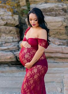 This red lace maternity gown is nothing short of stunning! This custom made gown is great for an outdoor maternity photoshoot. #SexyMamaMaternity #lacematernitygowns Maternity Dress With Lace Trim, Fitted Lace Maternity Dress For Wedding, Fitted Maternity Dress With Lace Bodice, Lace Maternity Dress With Lace Trim, Lace Maternity Dress With Scalloped Lace, Fitted Maternity Dress With Lace Sleeves, Lace Maternity Wedding Dress With Scalloped Lace, Maternity Lace Bodice Fitted Dress, Maternity Scallop Lace Fitted Dress