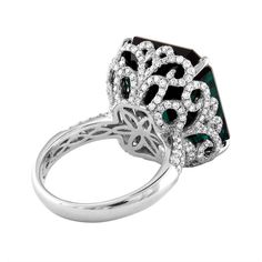 Stunning Tourmaline Ring The ring is 18K White Gold The center is 22.17 Carats Dark Bluish Tourmaline The Tourmaline is GIA Certified No Heat There are 1.22 Carats in Diamonds F/G VS/SI The ring is a size 6.5, sizable. The ring weighs 10.6 grams. Oval Halo Ring, Sapphire Halo Ring, 22k Gold Ring, Diamond Gold Ring, Green Sapphire Ring, Green Tourmaline Ring, Green Emerald Ring, Rubellite Tourmaline, Platinum Diamond Rings