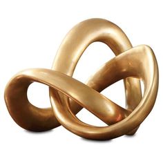 an image of a golden object that is in the shape of a knot on a white background