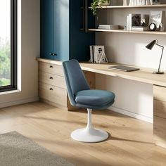 a blue chair sits in front of a desk with bookshelves and shelves on it