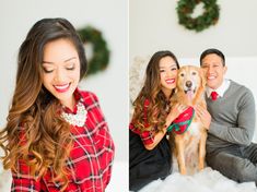 a man and woman sitting on a couch with a dog in front of them, both smiling at the camera