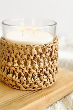 a close up of a candle on a table