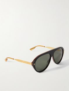 Gucci has always favoured a maximalist approach to design, especially with its sunglasses. These acetate shades have exaggerated aviator-style frames offset by gold-tone arms detailed with the house moniker at the temples. Tone Arms, Gucci Eyewear, Toned Arms, Aviator Style, Cycling Accessories, John Hardy, Sunglasses For Men, Eyewear Accessories, Luxury Gifts