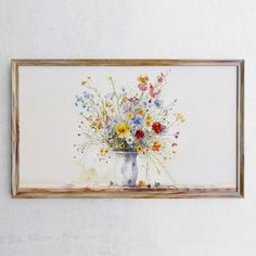 a painting of flowers in a vase on a wall