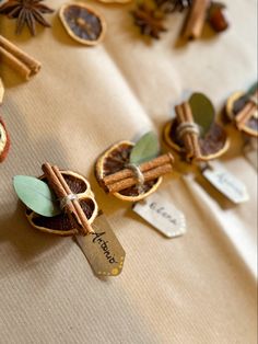 an assortment of spices and cinnamons are arranged on a tablecloth covered with brown paper