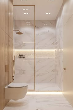 a modern bathroom with white marble walls and floor