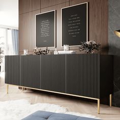 a black and gold sideboard with two chalkboards on the wall next to it