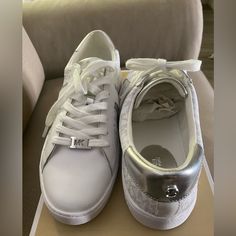 Brand New, Never Worn Michael Kors White Synthetic Sneakers, Casual Michael Kors Lace-up Sneakers, Michael Kors Synthetic Lace-up Sneakers, Michael Kors Black Lace-up Sneakers, White Michael Kors Shoulder Bag With Silver-tone Hardware, Michael Kors Leather Bags With Silver-tone Hardware, Michael Kors Shoes, White Silver, Womens Shoes Sneakers